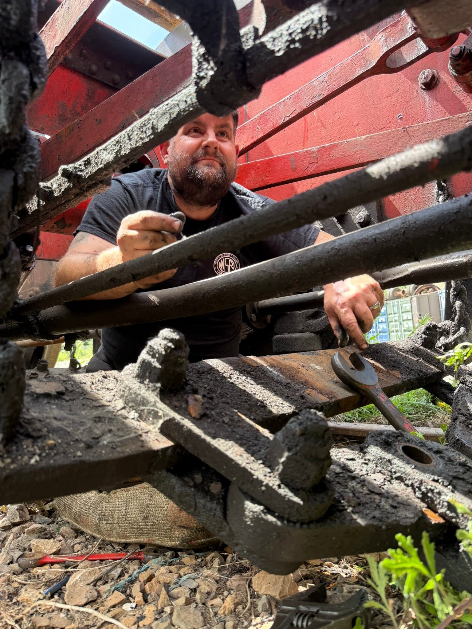 A Society volunteer working beneath Foxcote Manor’s brake gear